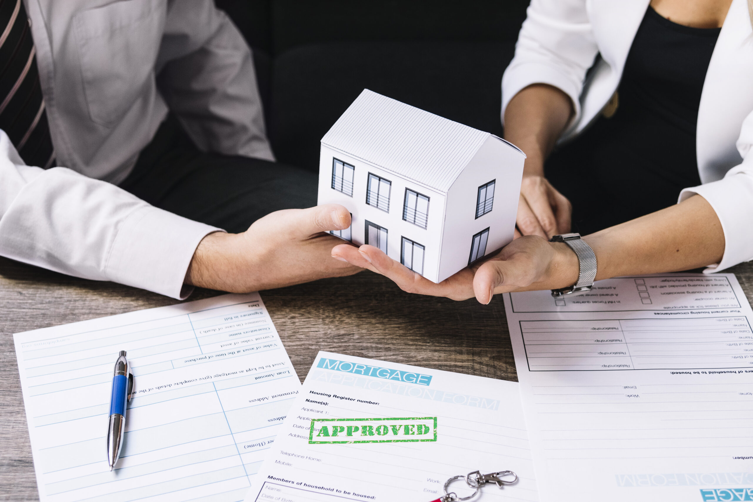 realtor making deal with customer office scaled